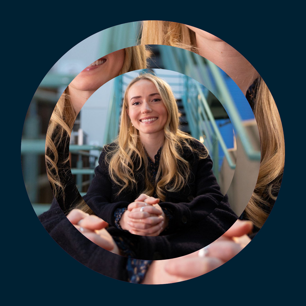 student smiling at the camera