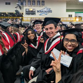 Rebecca-Duarte-graduating-with-her-friends