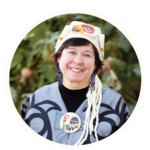Smiling woman in Metis regalia